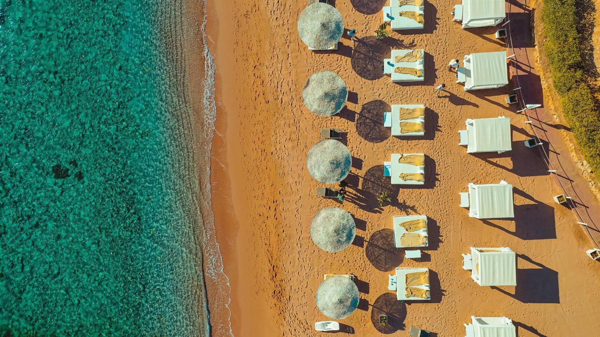 Domina Coral Bay Resort, Diving , Spa & Casino Sharm el-Sheikh Bagian luar foto Aerial view of the beach