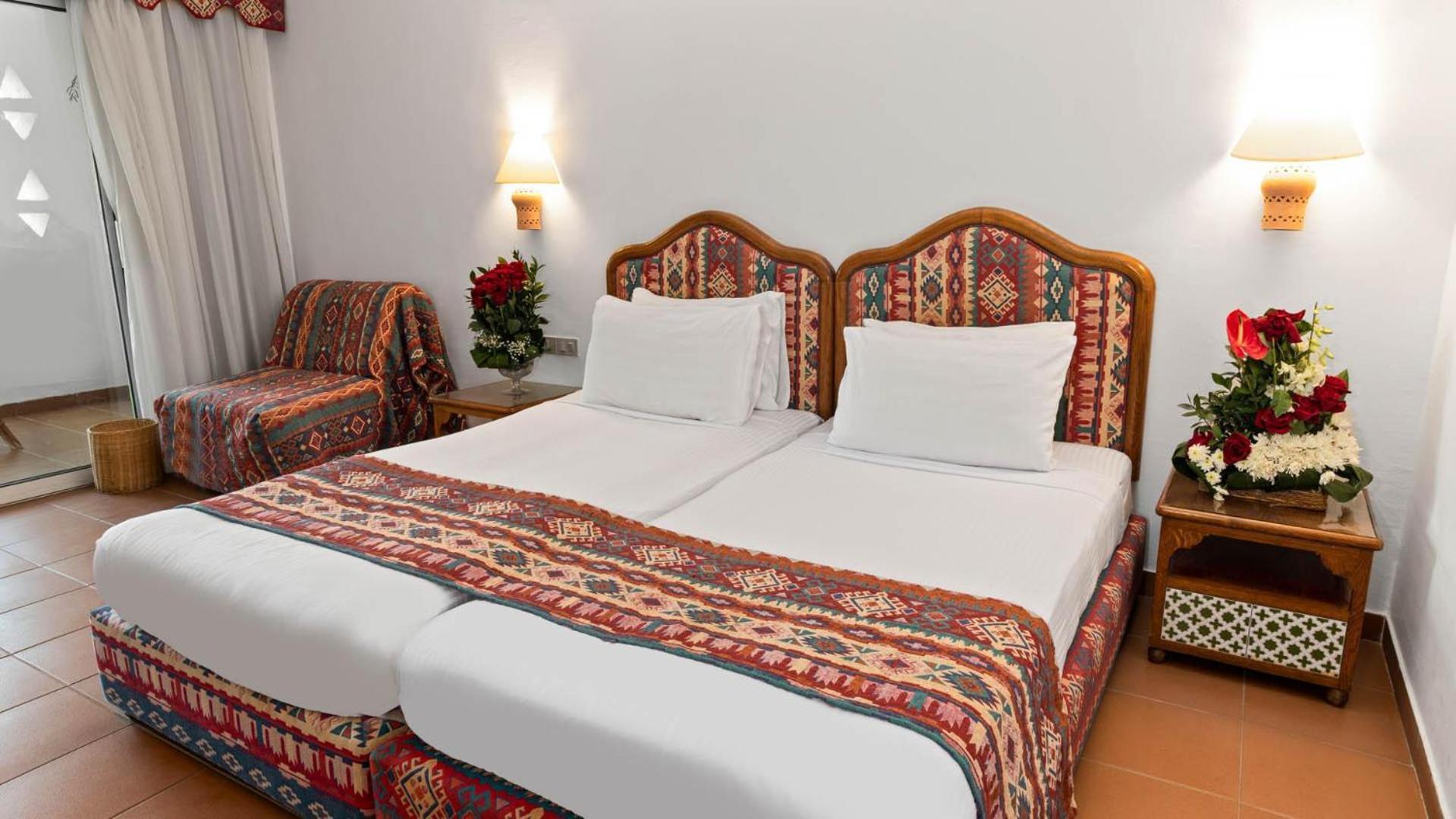 Domina Coral Bay Resort, Diving , Spa & Casino Sharm el-Sheikh Bagian luar foto A guest room at the hotel
